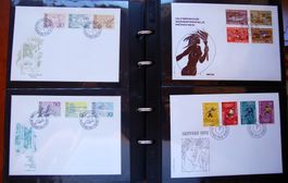 84 FDC divers pays dans un album ocre