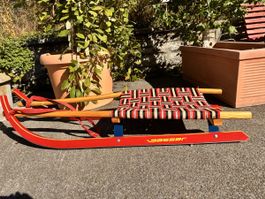 Gasser Renneodel Holz mit Textilsitz rot guter Zustand
