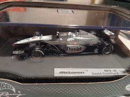 A collectible scale model 1/43 McLaren MP4/14 from Minichamps F1