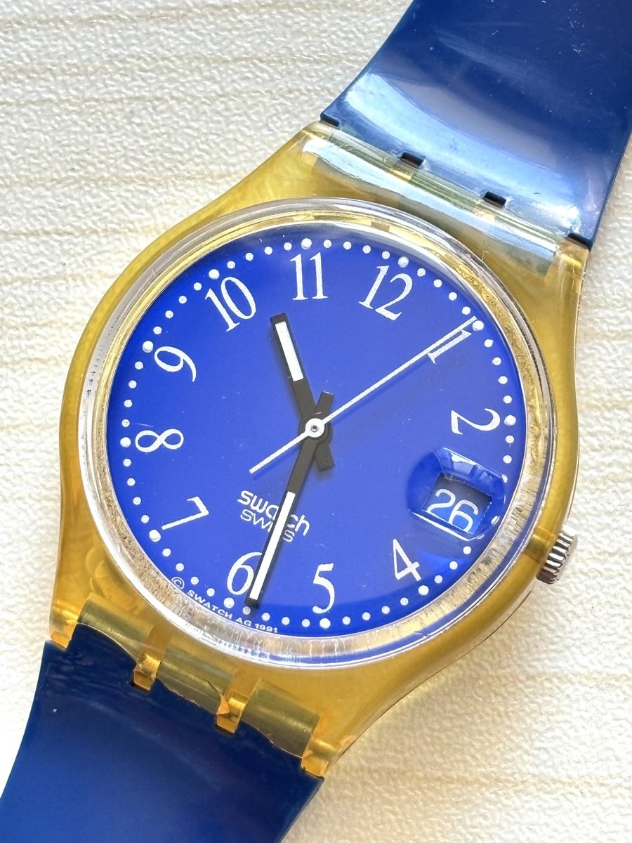 Swatch Uhren: Swatch Uhr blau gold transparent Datum  – Gebraucht aus Grenchen von chththl