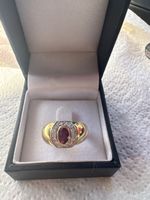 Bague or 18K rubis et diamants
