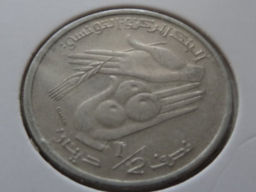 Tutti le monete: TUNISIE  1/2  Dinar  1997 – Usato da Romanel-sur-Lausanne venduto da Swift13 1