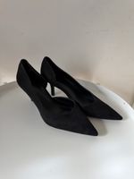 Black pointed heels 