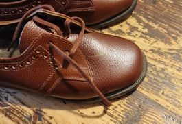 Süsse braune Kinderschuhe, sehr alt war model