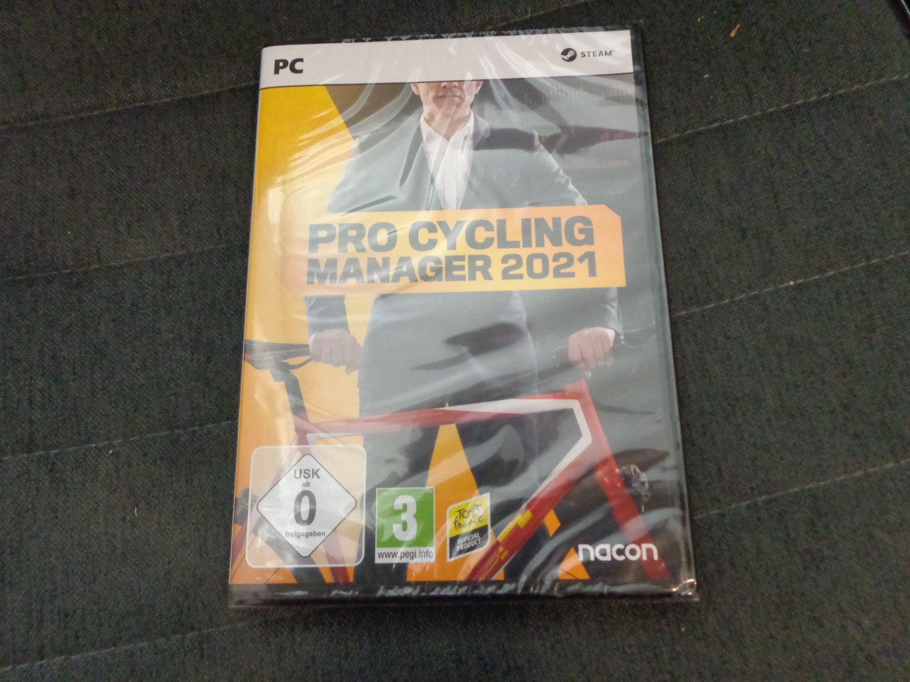 Spiele: Pro Cycling Manager 2021 PC NEUWARE – Neu und originalverpackt aus Olten von Disc-Ausverkauf