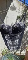 Schwarzes Corsagen-Top mit Spitze für Sommerabende 38