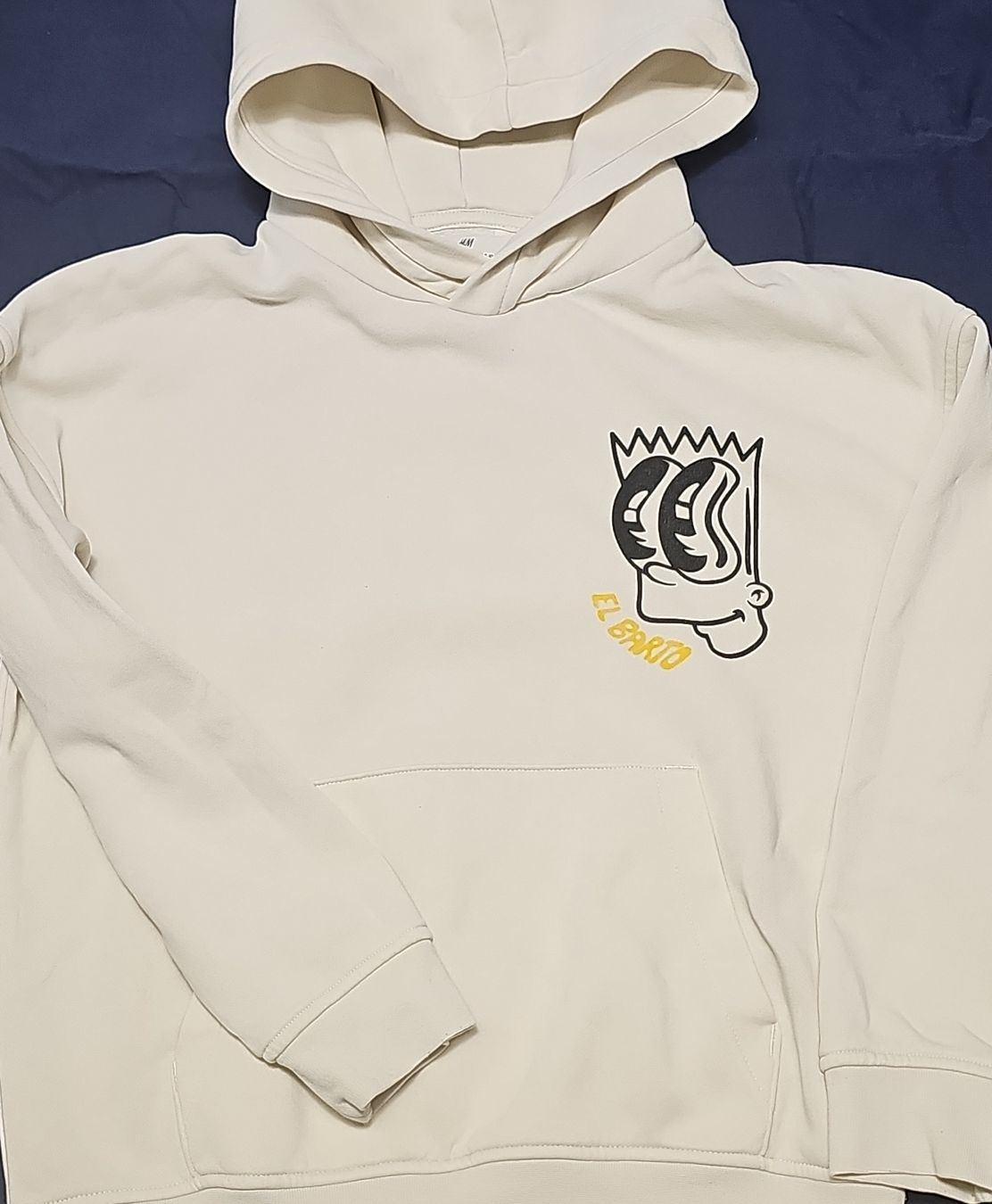 H&M Pullover & Sweatshirts: Kapuzenpullover H&M Bart Simpson weiss Grösse 140 – Gebraucht aus Liestal von GrotteD 1