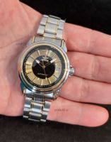 Sportliche Automatik Herrenuhr Bicolor mit Datum