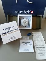 Swatch x Omega Mission to Earthphase Moonshine Gold Snoopy