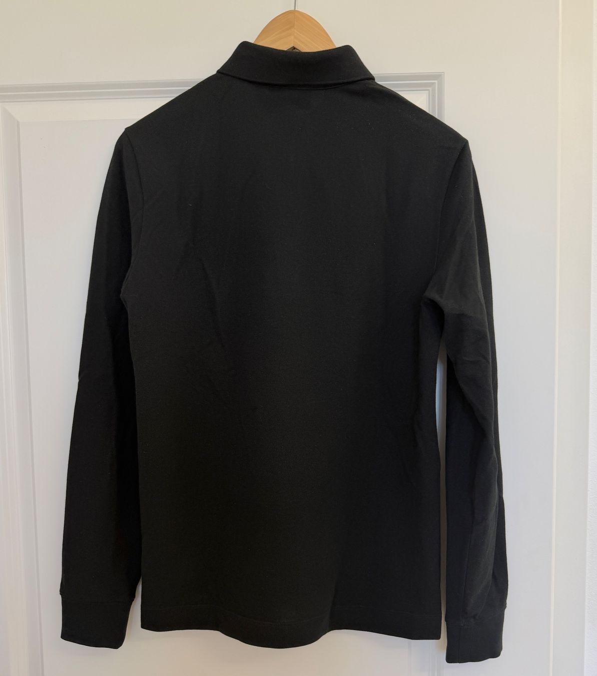 Lacoste Polo-Shirts: Polo manches longues noir Lacoste – Gebraucht aus giffers von sev_c9x9 1