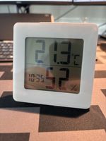 Clock with thermometer and humidity gauge