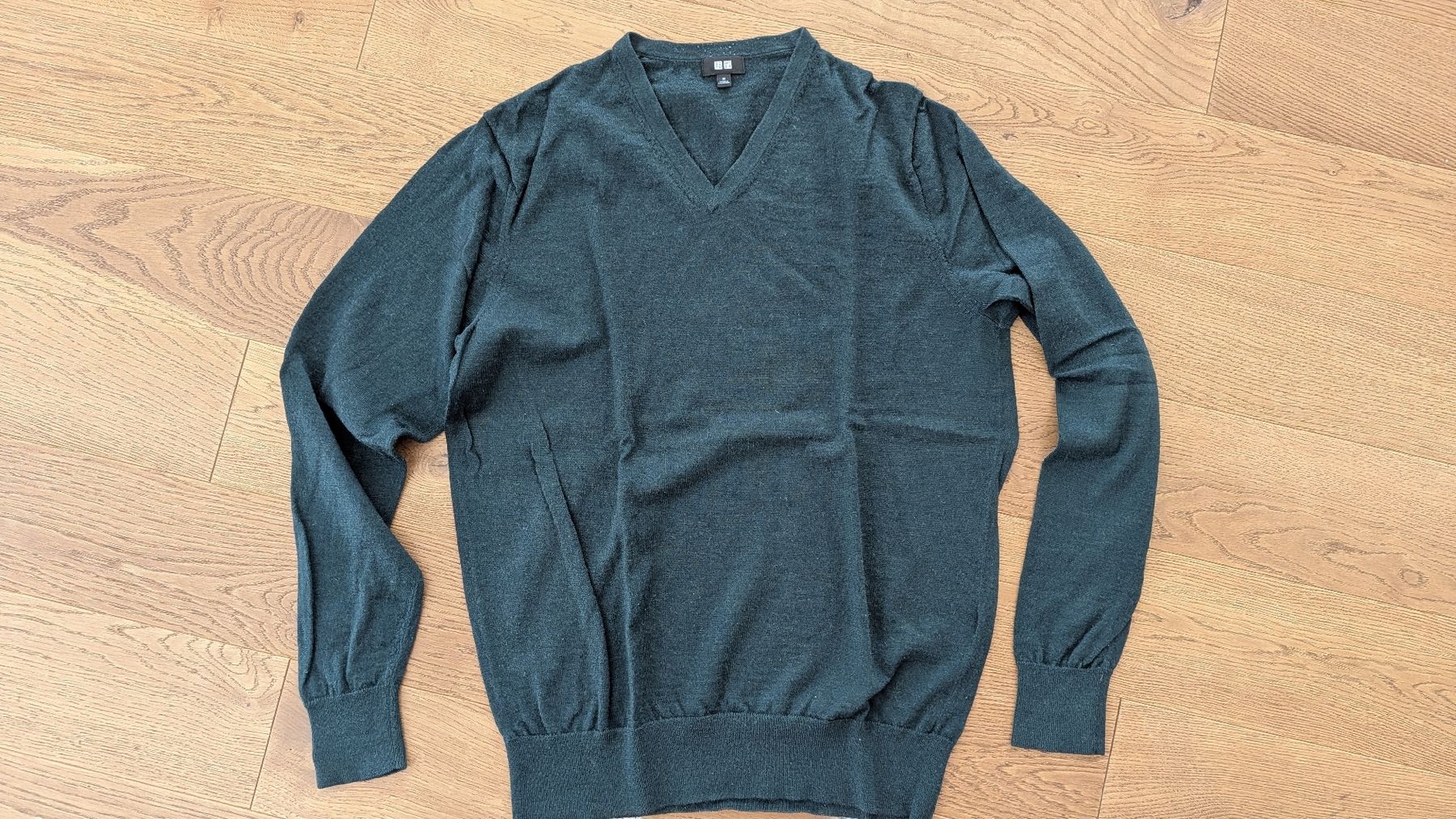 Uniqlo Maglioni & Felpe: Uniqlo Pullover aus Wolle dunkelgrün Gr. M  – Usato da Zürich venduto da broedl