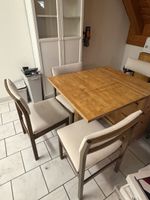 IKEA extendable table with 4 wooden chairs