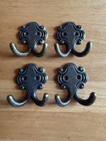 4 Doppelhaken aus Metall 