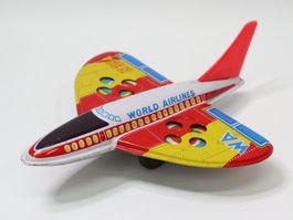 Blech Flugzeug World Airlines mit Farbwechsel made in Japan