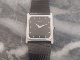 Montre à remontge manuel - cadran noir