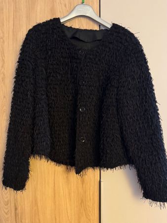 Veste noire élégante - Parfaite pour la mi-saison!