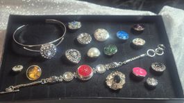 2 bracciali con bottone intercambiabile