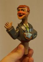 Korkzapfen mit geschnitzter Figur