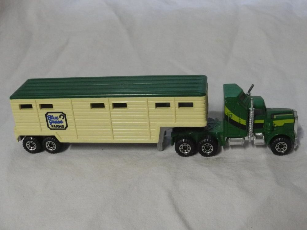 Matchbox Voitures modèles: MATCHBOX  KENWORTH WITH LOW BED TRAILER 1981 UNBESPIELT – D'occasion à Gurtnellen par Murmeli99 3