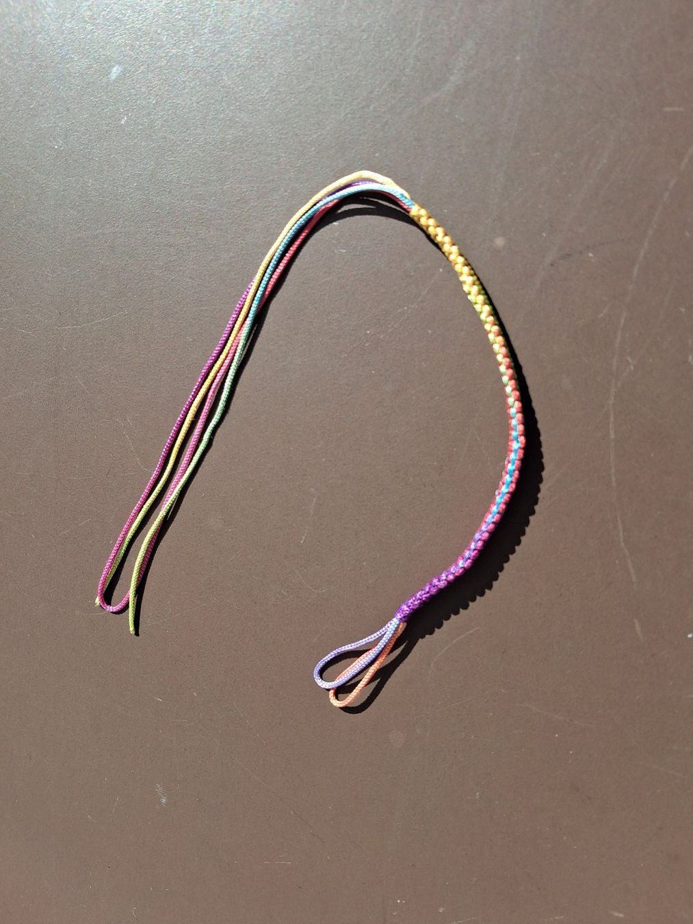 Bracciali & Braccialetti: Stoffarmband Regenbogenfarben, Neu! – Nuovo e nell'imballaggio originale da Wald ZH venduto da e8e 2