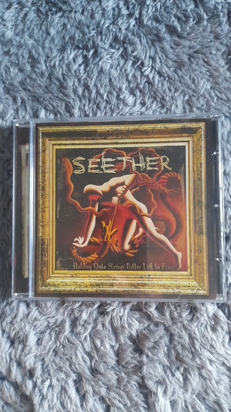 CD: SEETHER    HOLDING ONTO STRINGS BETTER LEFT TO FRAY   CD – Usato da Wetzikon ZH venduto da Ramones01