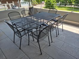 Gartentisch mit 8 Stühlen und Polstern Metall schwarz