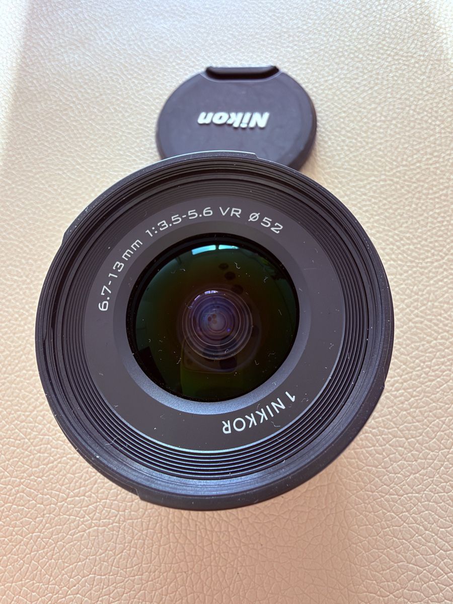 Nikon Objektive: Nikon 1 6.7-13mm Objektiv – Gebraucht aus Winterthur von R2D_Y7C 1