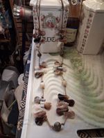 Handgefertigten mit Muscheln oder Perlmutt.
