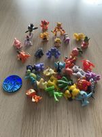 32 figurines Pokémon 