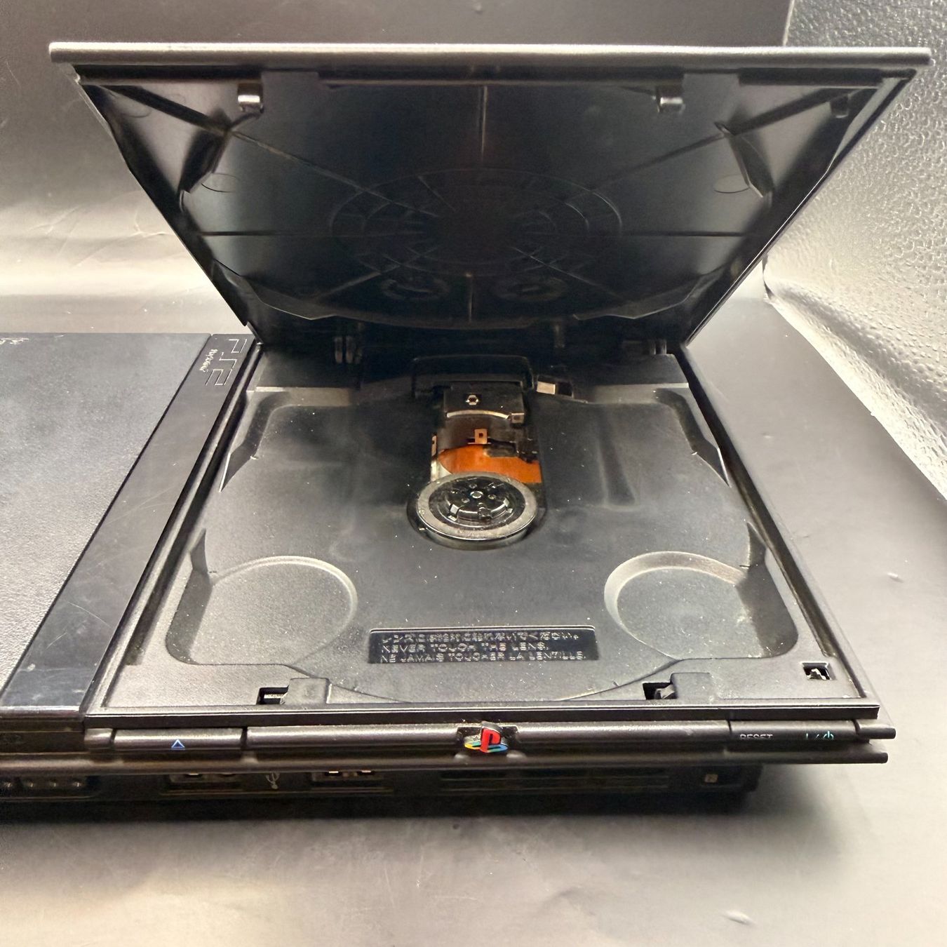 Sony Konsolen: Sony PlayStation 2 PS2 Slim Schwarz SCPH-75004 – Gebraucht aus Düdingen von Nerdworld 1