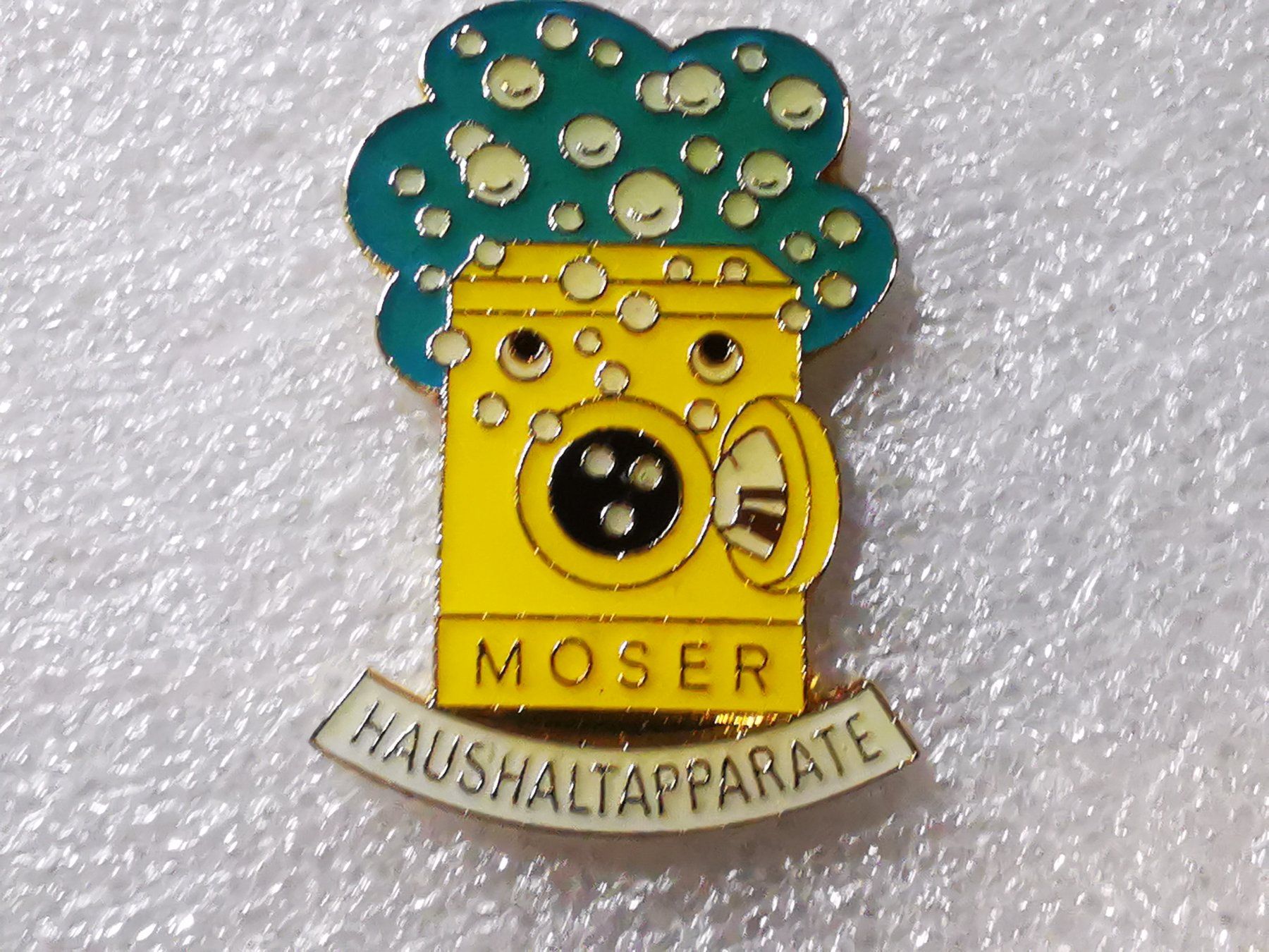 Placchette & Badge: Ansteckpin 127: Moser Haushaltsapparate – Usato da Oppligen venduto da Pin-Fall-Shop