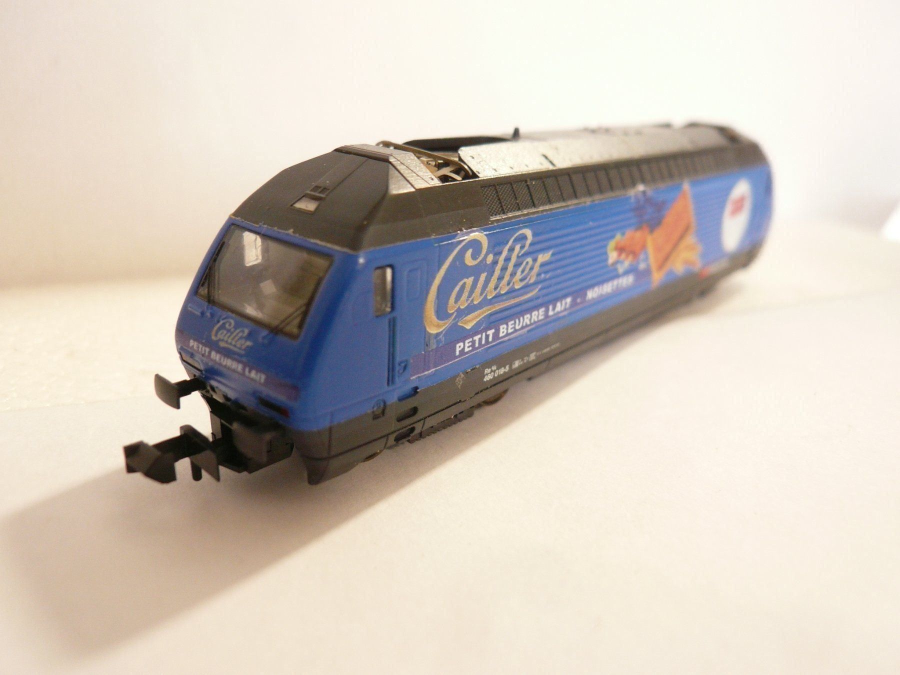 Trix Modelleisenbahnen: MINITRIX RE 460   "  CAILLER NOISETTES KAMBLY  " – Neu und originalverpackt aus Pfaffnau von nolff 2