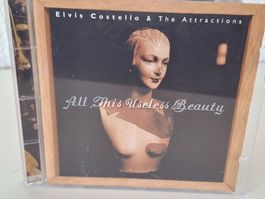 CD Elvis Costello & Attractions - All This Useless Beauty😎