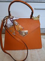 Sac à main orange Maison Heritage Paris