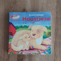 Spiel- und Fühlbilderbuch mit Puzzleteilen