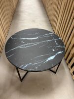 Runder Couchtisch in Marmoroptik aus Glas