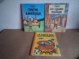 3 BD en francais: 2x Tintin et Milou et 1x les Schtroumpfs
