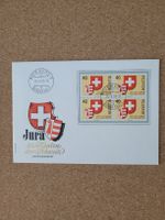 Umschlag mit 4er Block Jura Helvetia