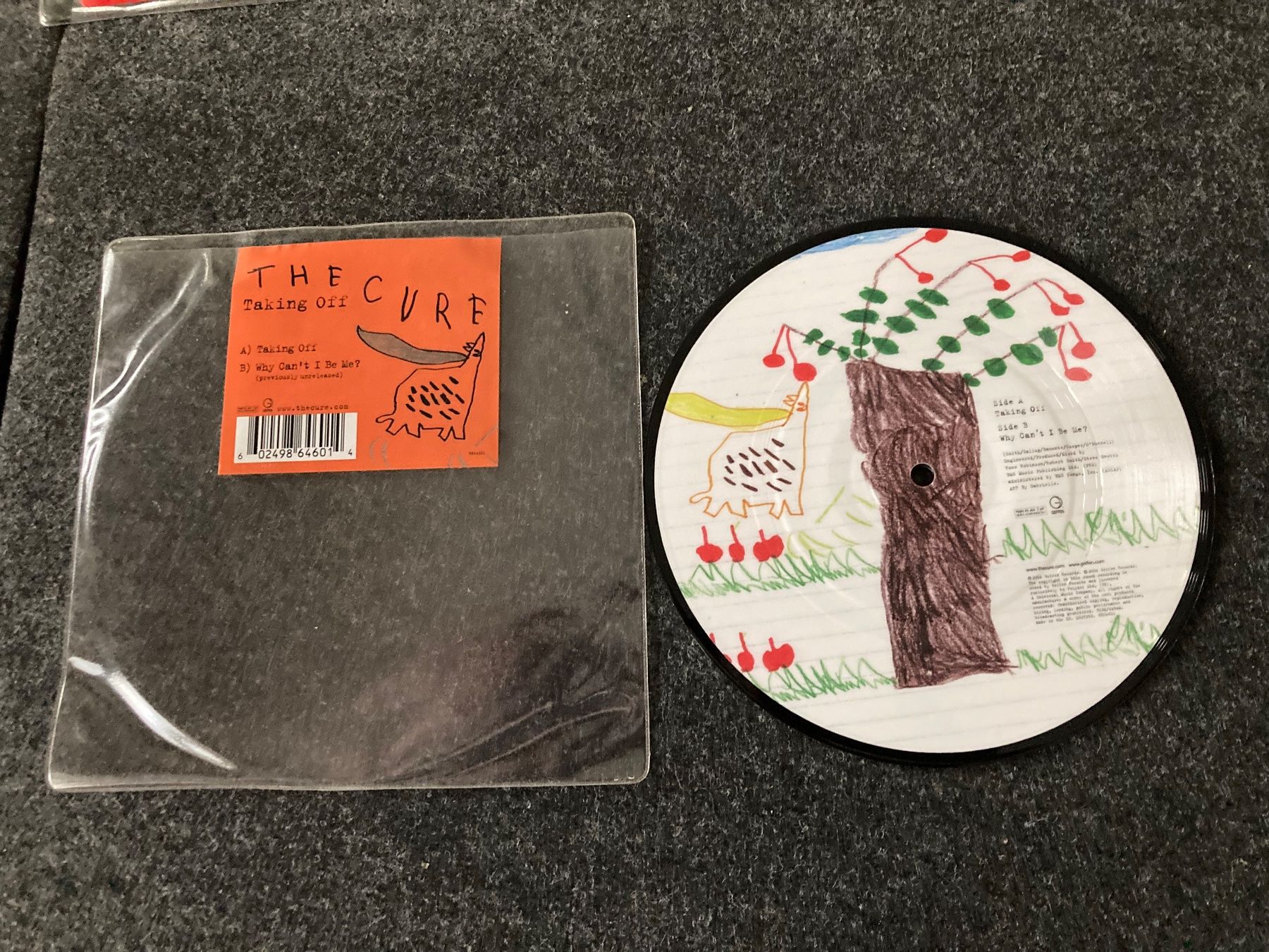 Dischi in vinile: The Cure - Taking Off  (Picture Disc) (7") – Usato da Fribourg venduto da Karushi 1