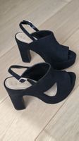 Schwarze Plateau-Sandalen mit Absatz