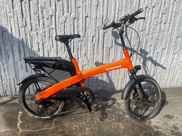 2x E-Bikes Winora Town EXP (1x noir + 1x orange)