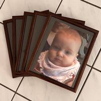 Cornici porta fotografie in legno