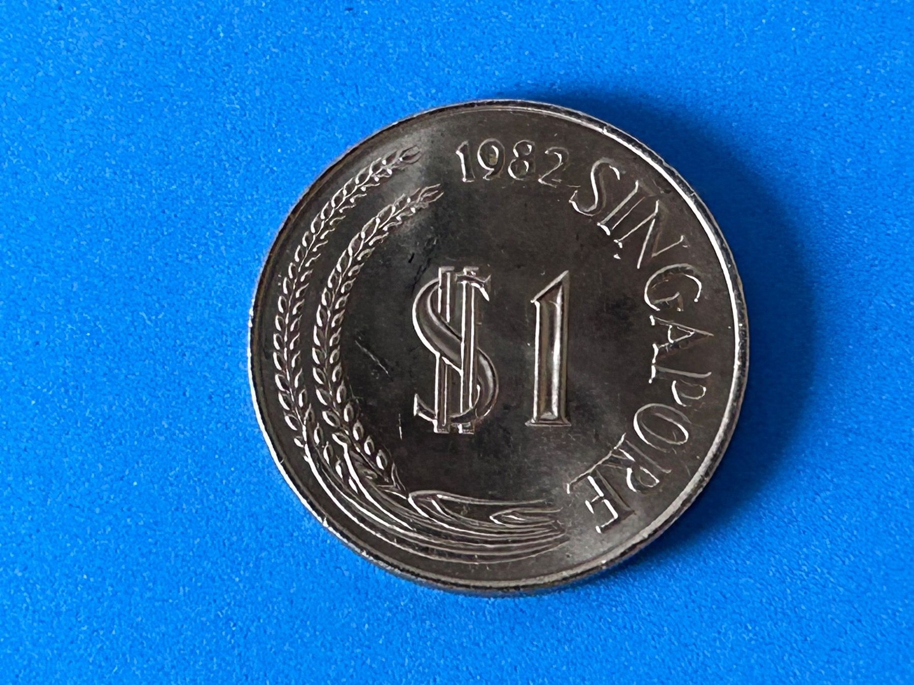 Tutti le monete: Singapore - 1 Dollar 1982 – Usato da Corcelles NE venduto da AJKader 6
