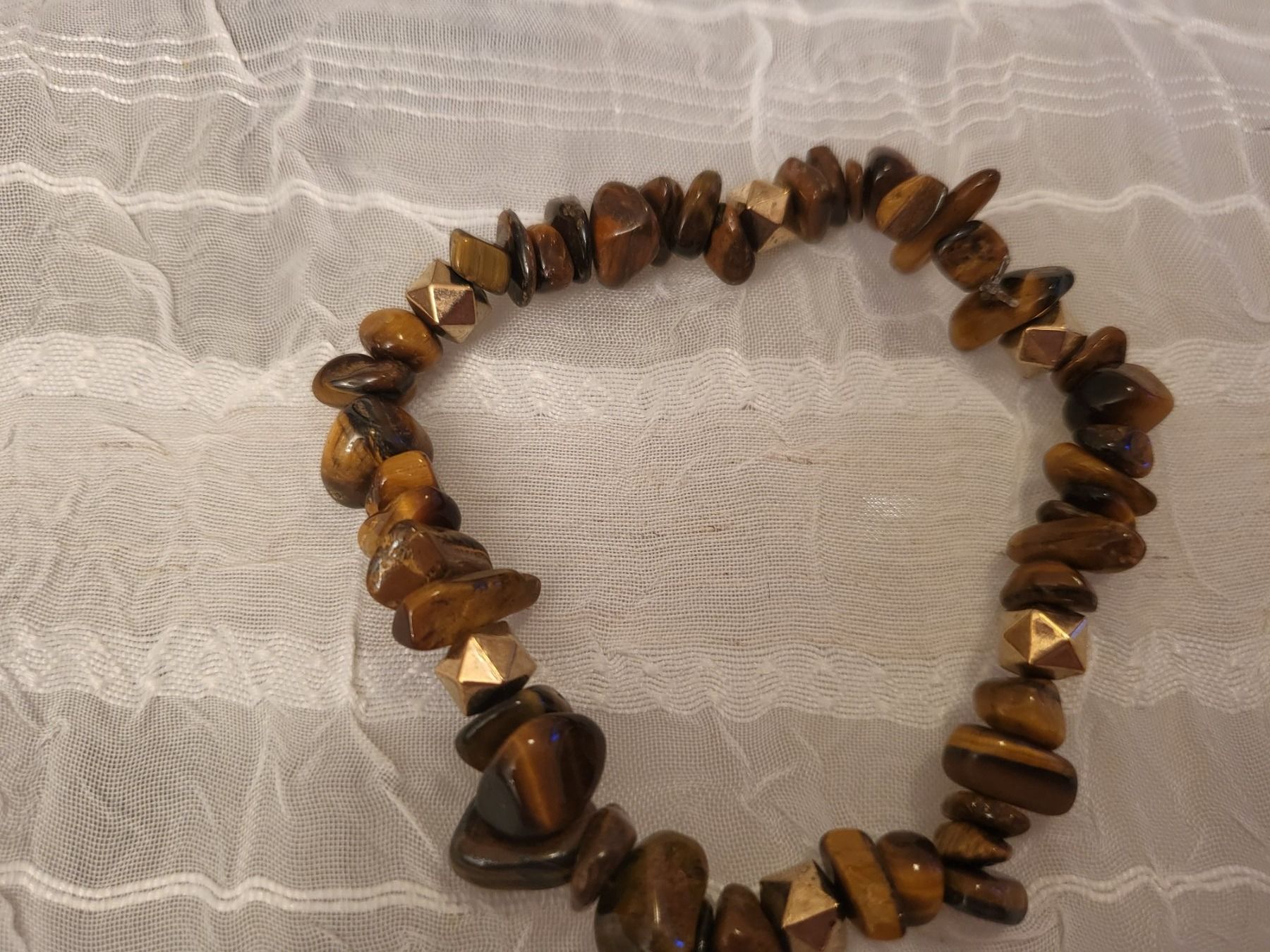 Bracciali & Braccialetti: Edelstein Splitter Armkette Tiegerauge – Nuovo (secondo la descrizione) da Dietikon venduto da Eleda