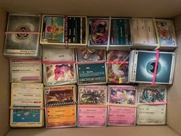 750 cartes Pokemon + album