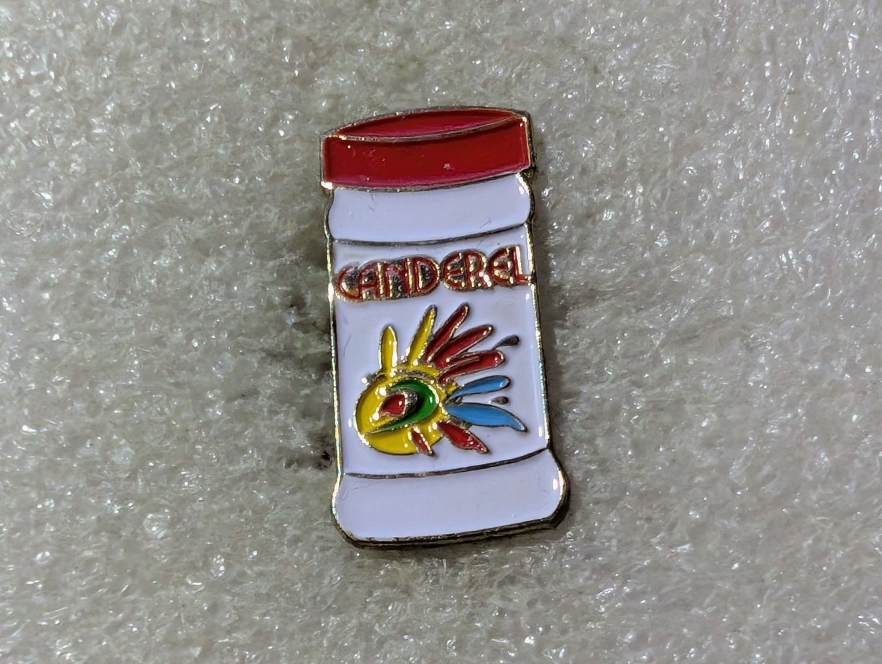 Plaketten & Abzeichen: Ansteckpin 2: Canderel – Gebraucht aus Oppligen von Pin-Fall-Shop
