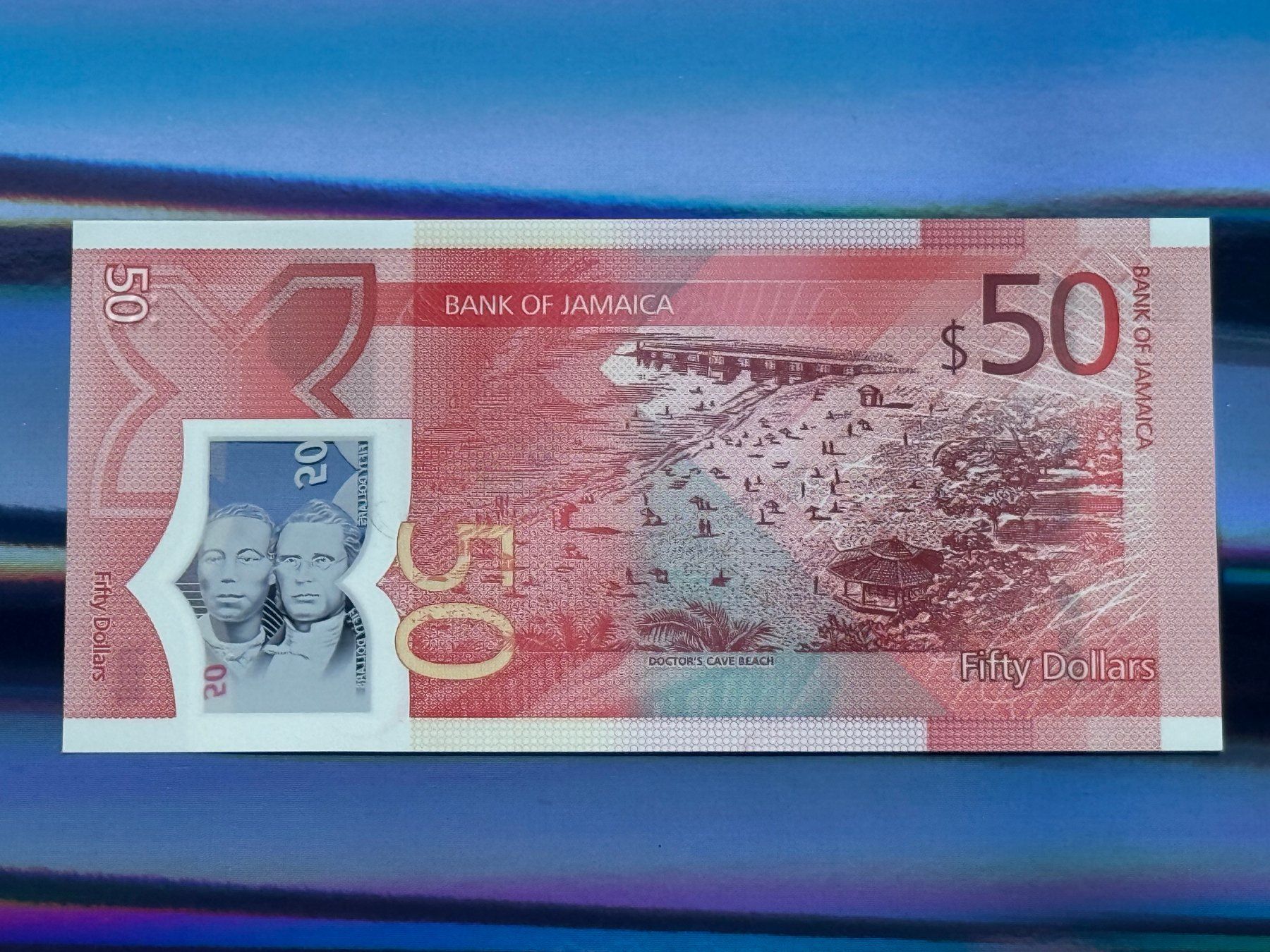 Banconote: GORDON & BOGLE - Jamaica 2022 - 50 Dollars UNC - Polymer – Nuovo e nell'imballaggio originale da Pfäffikon SZ venduto da Sieben77 1