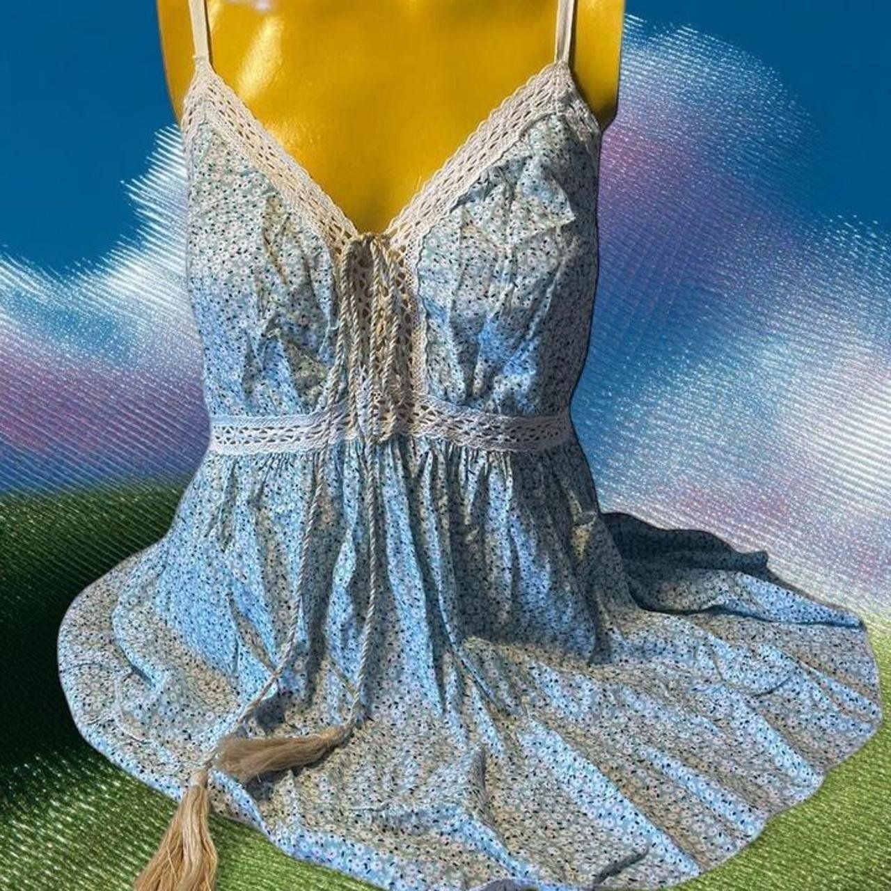 T-shirt: T-shirt fleuri avec dentelle - S – Usato da Troinex venduto da Irisglo