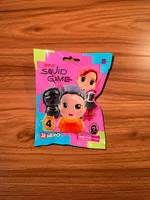 [NEUF] Squeezies Squid Game - Sac Surprise (Squishy)